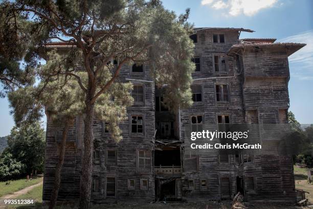 The exterior of the dilapidated Prinkipo Greek Orthodox Orphanage, is seen on July 7, 2018 in Buyukada, Turkey. The historic 20,000-square-meter...