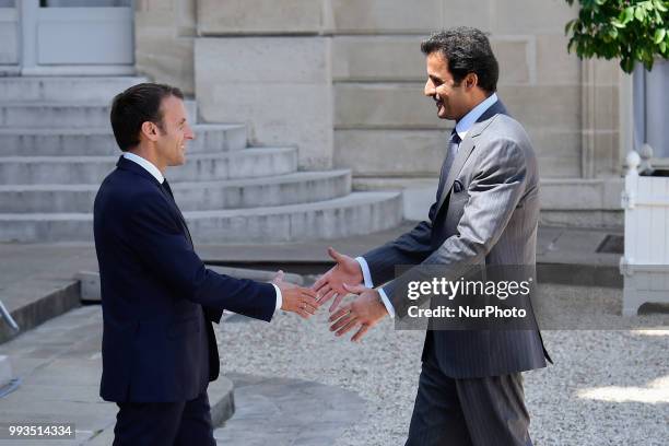 French President Emmanuel Macron welcomes Emir of Qatar Sheikh Tamim bin Hamad Al Thani at the Elysee Palace in Paris, France on July 06, 2018.