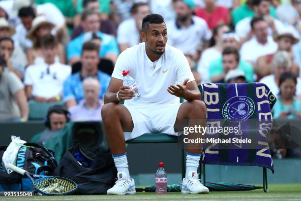 Nick Kyrgios of Australia reacts against Kei Nishikori of Japan during their Men's Singles third round match on day six of the Wimbledon Lawn Tennis...