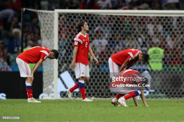 Russia players look exhausted at the end of second half during the 2018 FIFA World Cup Russia Quarter Final match between Russia and Croatia at Fisht...