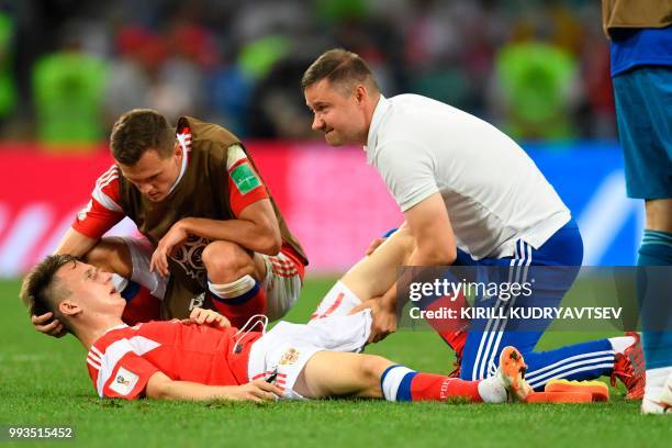 Russia's midfielder Denis Cheryshev and Russia's midfielder Aleksandr Golovin before the extra time of the Russia 2018 World Cup quarter-final...