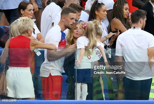 Jordan Henderson of England and his wife Rebecca Burnett and kids following the 2018 FIFA World Cup Russia Quarter Final match between Sweden and...