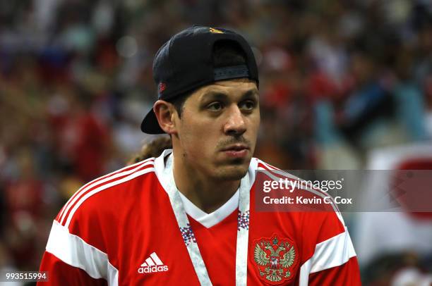 Russian professional ice hockey player Evgeni Malkin looks on during the 2018 FIFA World Cup Russia Quarter Final match between Russia and Croatia at...