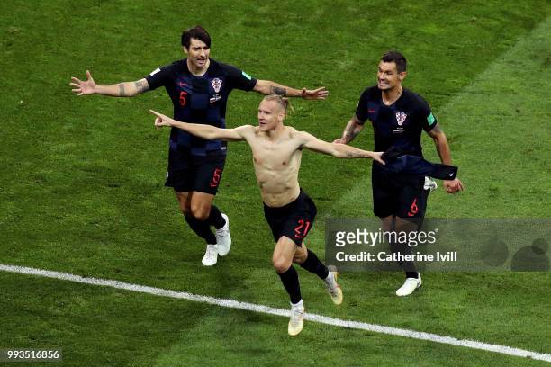 Domagoj Vida of Croatia celebrates with team mates Dejan Lovren and Vedran Corluka after scoring his team's second goal during the 2018 FIFA World...