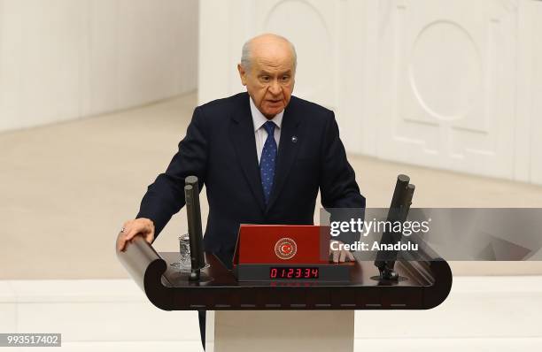 Turkey's Nationalist Movement Party's Leader Devlet Bahceli swears in during a meeting on the new Legislative Year of the 27th Term of Grand National...