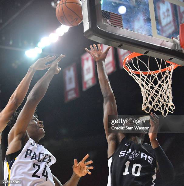 Alize Johnson of the Indiana Pacers shoots against Chimezie Metu of the San Antonio Spurs during the 2018 NBA Summer League at the Thomas & Mack...