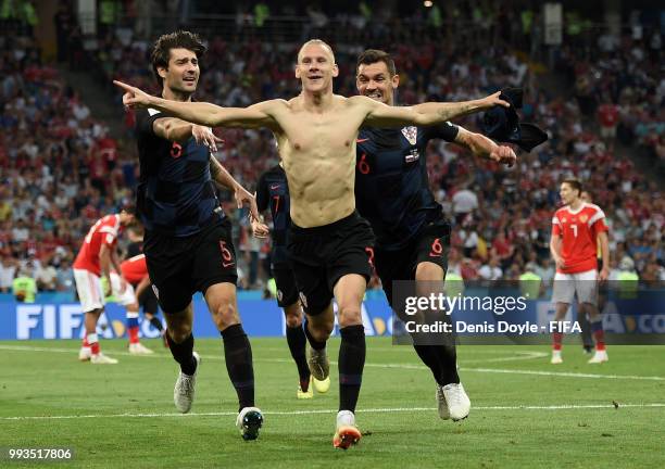 Domagoj Vida of Croatia celebrates after scoring his team's 2nd goal in extra time during the 2018 FIFA World Cup Russia Quarter Final match between...