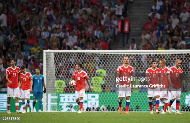 Aleksandr Erokhin, Aleksandr Golovin, Igor Akinfeev, Fedor Smolov, Sergey Ignashevich, Roman Zobnin, Iury Gazinsky and Fedor Kudriashov of Russia...