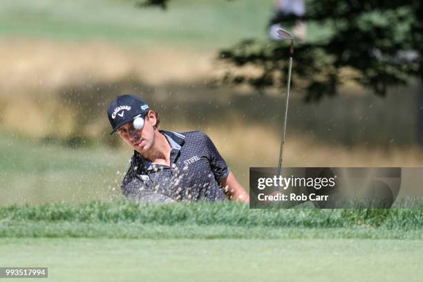 Kelly Kraft hits out of the bunker on the sixth hole during round three of A Military Tribute At The Greenbrier held at the Old White TPC course on...
