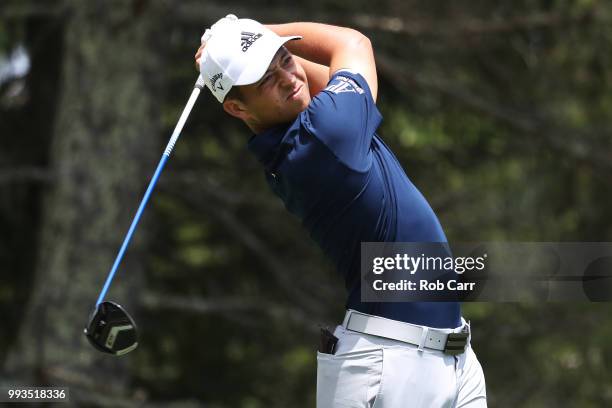 Xander Schauffele tees off the sixth hole during round three of A Military Tribute At The Greenbrier held at the Old White TPC course on July 7, 2018...
