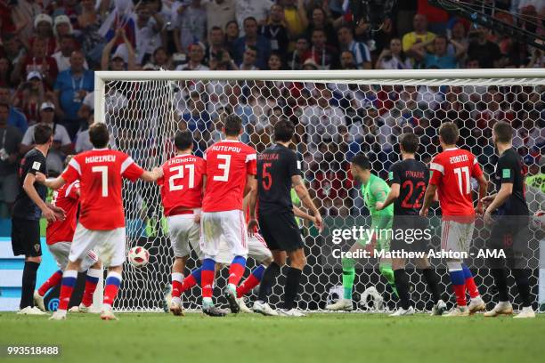 Mario Fernandes of Russia scores a goal to make it 2-2 in extra time during the 2018 FIFA World Cup Russia Quarter Final match between Russia and...