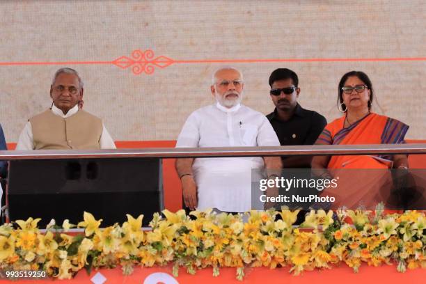 Prime Minister Narendra Modi with Rajasthan Chief Minister Vasundhara Raje and Rajasthan Governor Kalyan Singh during a public meeting for the...