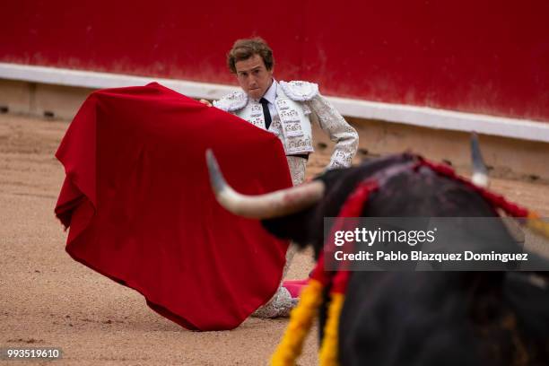 Spanish bullfighter Roman performs with a bull from Puerto de San Lorenzo's fighting bulls during a bullfight on the second day of the San Fermin...