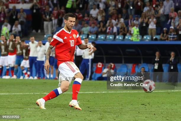 Fedor Smolov of Russia misses his team's first penalty in the penalty shoot out during the 2018 FIFA World Cup Russia Quarter Final match between...