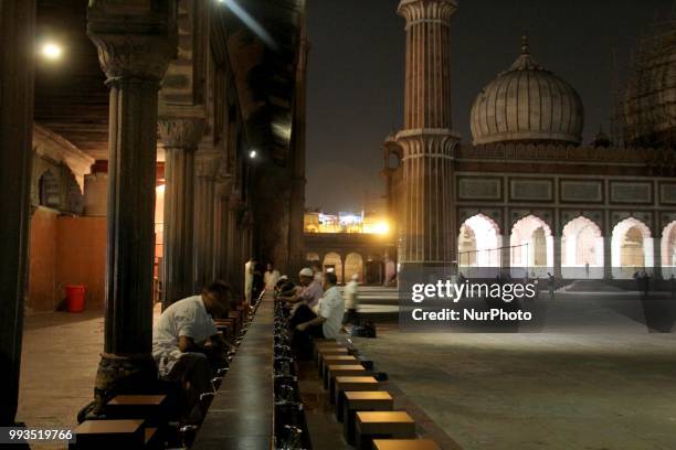 Muslims perform ablution before Isha prayers at Historic Jamia Masjid in Old Quarters of Delhi, India, on 7 July 2018.