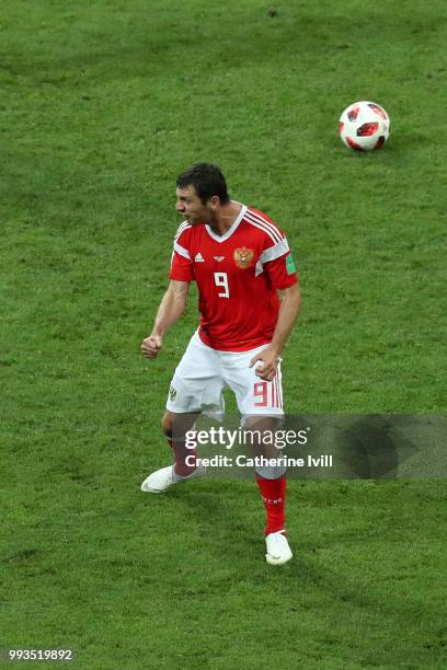 Alan Dzagoev of Russia celebrates scoring his team's second penalty in the penalty shoot out during the 2018 FIFA World Cup Russia Quarter Final...