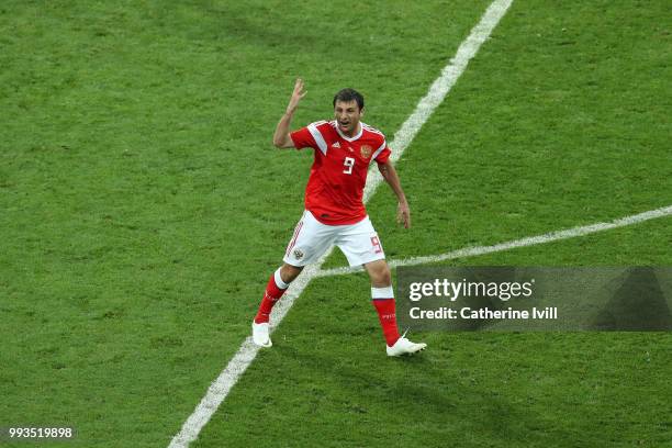 Alan Dzagoev of Russia celebrates scoring his team's second penalty in the penalty shoot out during the 2018 FIFA World Cup Russia Quarter Final...