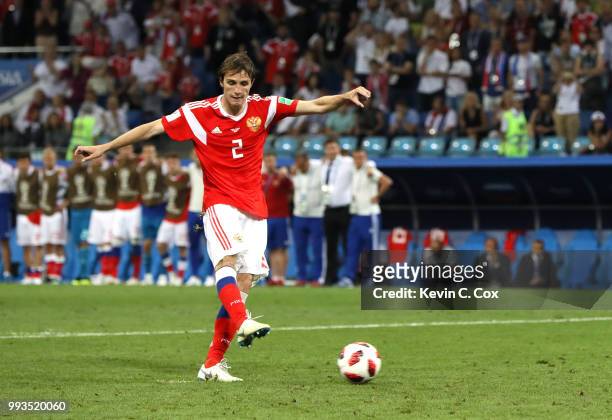 Mario Fernandes of Russia misses his team's third penalty in the penalty shoot out during the 2018 FIFA World Cup Russia Quarter Final match between...