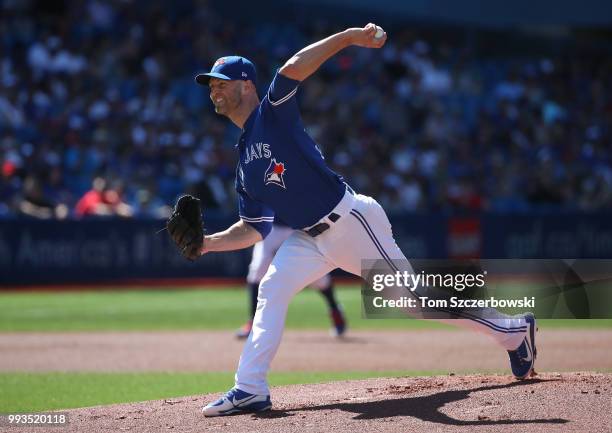 Happ of the Toronto Blue Jays delivers a pitch in the first inning during MLB game action against the New York Yankees at Rogers Centre on July 7,...