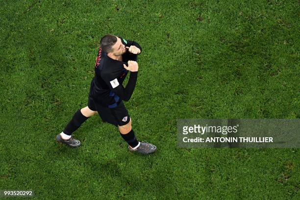 Croatia's midfielder Mateo Kovacic reacts after missing his penalty during the penalty shootouts of the Russia 2018 World Cup quarter-final football...