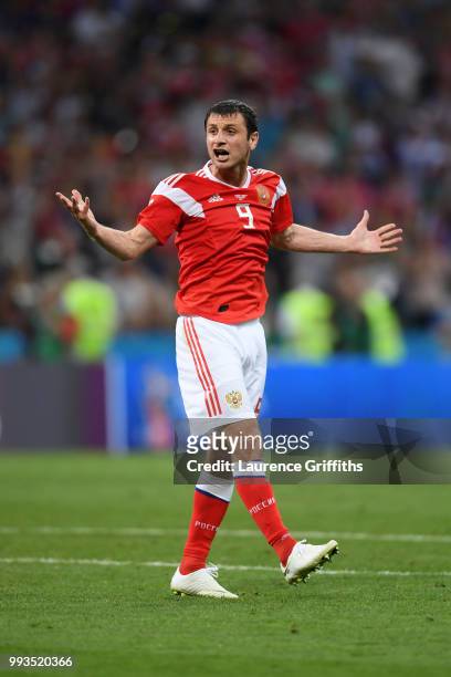 Alan Dzagoev of Russia celebrates scoring his team's second penalty in the penalty shoot out during the 2018 FIFA World Cup Russia Quarter Final...