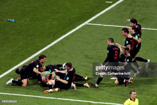 Croatia players celebrate winning the penalty shoot out during the 2018 FIFA World Cup Russia Quarter Final match between Russia and Croatia at Fisht...