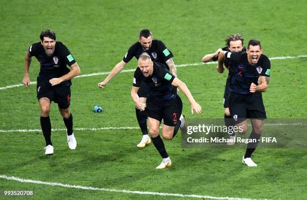 Croatia players celebrate winning the penalty shoot out during the 2018 FIFA World Cup Russia Quarter Final match between Russia and Croatia at Fisht...