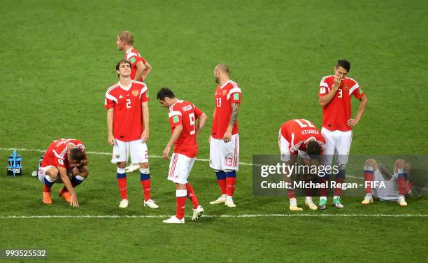 PLayers of Russia show their dejection following the defeat in the 2018 FIFA World Cup Russia Quarter Final match between Russia and Croatia at Fisht...