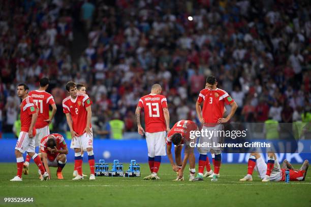 Players of Russia show their dejection following the defeat in the 2018 FIFA World Cup Russia Quarter Final match between Russia and Croatia at Fisht...