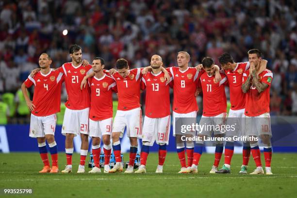 Russia players watch the penalty shoot out during the 2018 FIFA World Cup Russia Quarter Final match between Russia and Croatia at Fisht Stadium on...