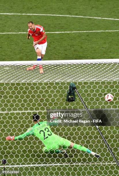Sergey Ignashevich of Russia scores his team's fourth penalty in the penalty shoot out during the 2018 FIFA World Cup Russia Quarter Final match...