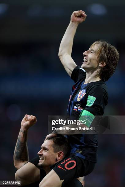 Dejan Lovren of Croatia and Luka Modric of Croatia celebrate following their sides victory in the 2018 FIFA World Cup Russia Quarter Final match...