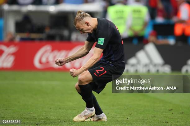 Domagoj Vida of Croatia celebrates scoring in a penalty shootout during the 2018 FIFA World Cup Russia Quarter Final match between Russia and Croatia...