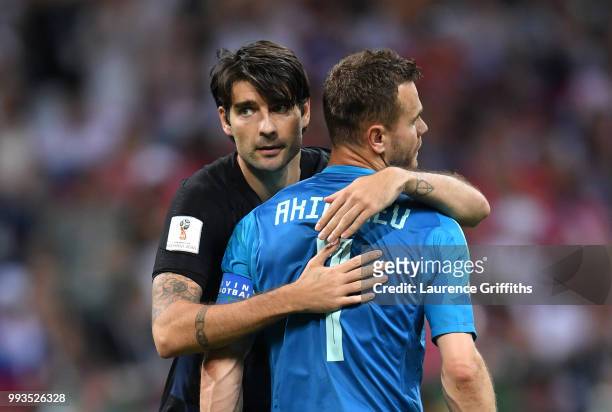 Vedran Corluka of Croatia consoles Igor Akinfeev of Russia following Russia's defeat in the penalty shoot out during the 2018 FIFA World Cup Russia...