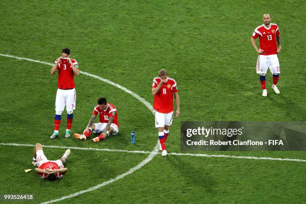 PLayers of Russia show their dejection following the defeat in the 2018 FIFA World Cup Russia Quarter Final match between Russia and Croatia at Fisht...