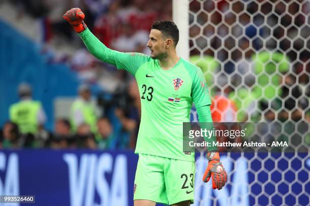 Danijel Subasic of Croatia celebrates after Mario Fernandes of Russia put his penalty wide in a penalty shootout during the 2018 FIFA World Cup...
