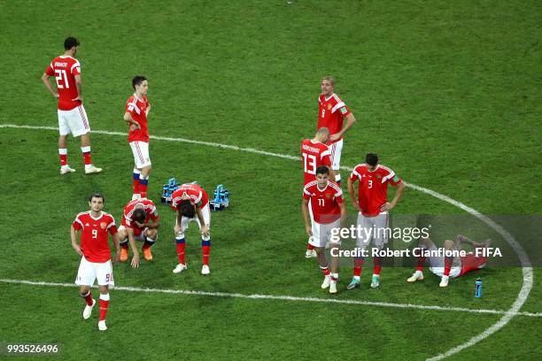 PLayers of Russia show their dejection following the defeat in the 2018 FIFA World Cup Russia Quarter Final match between Russia and Croatia at Fisht...