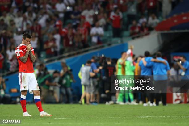 Fedor Smolov of Russia looks dejected follwing his team's defeat in the 2018 FIFA World Cup Russia Quarter Final match between Russia and Croatia at...
