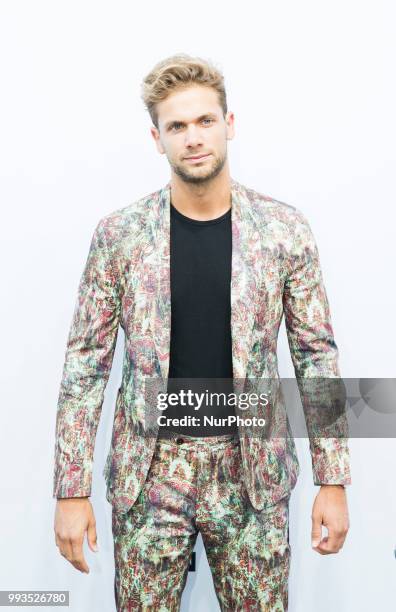 Guest arrives to attend the Riani Fashion Show during the Mercedes Benz Fashion Week at ewerk in Berlin, Germany on July 4, 2108.