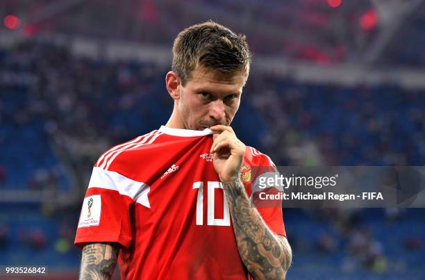 Fedor Smolov of Russia looks dejected follwing his team's defeat in the 2018 FIFA World Cup Russia Quarter Final match between Russia and Croatia at...