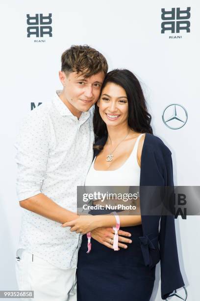 Sascha Koslowski and Paola Maria Koslowski arrive to attend the Riani Fashion Show during the Mercedes Benz Fashion Week at ewerk in Berlin, Germany...