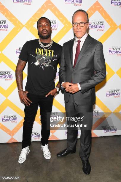 Meek Mill and Lester Holt attend the 2018 Essence Festival presented by Coca-Cola at Ernest N. Morial Convention Center on July 7, 2018 in New...