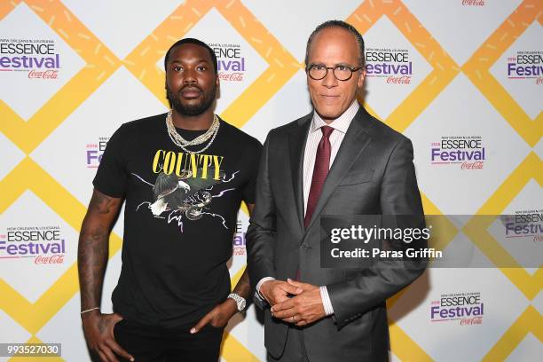 Meek Mill and Lester Holt attend the 2018 Essence Festival presented by Coca-Cola at Ernest N. Morial Convention Center on July 7, 2018 in New...