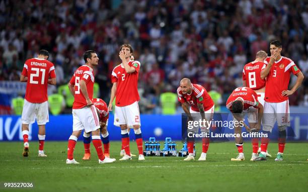 PLayers of Russia show their dejection following the defeat in the 2018 FIFA World Cup Russia Quarter Final match between Russia and Croatia at Fisht...