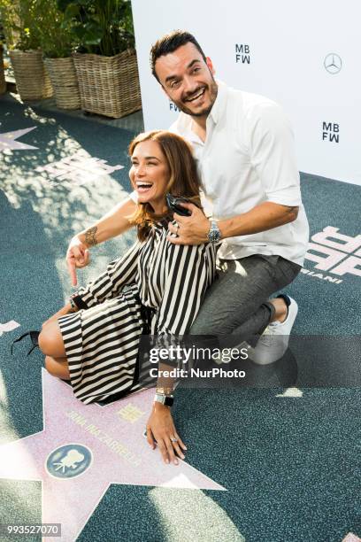 Jana Ina Zarrella and Giovanni Zarrella arrive to attend the Riani Fashion Show during the Mercedes Benz Fashion Week at ewerk in Berlin, Germany on...