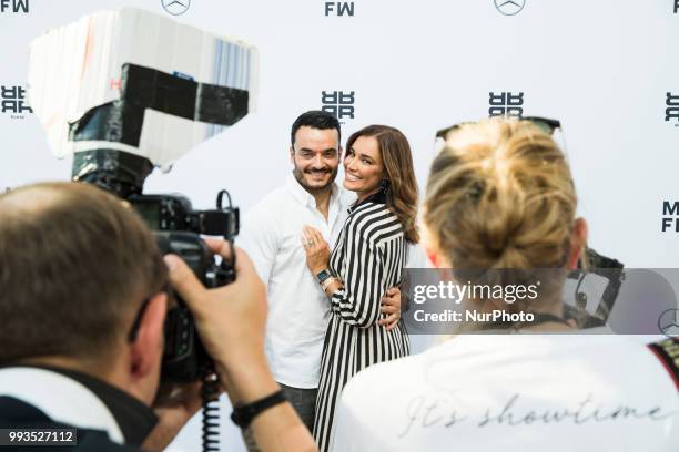 Jana Ina Zarrella and Giovanni Zarrella arrive to attend the Riani Fashion Show during the Mercedes Benz Fashion Week at ewerk in Berlin, Germany on...