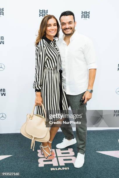 Jana Ina Zarrella and Giovanni Zarrella arrive to attend the Riani Fashion Show during the Mercedes Benz Fashion Week at ewerk in Berlin, Germany on...