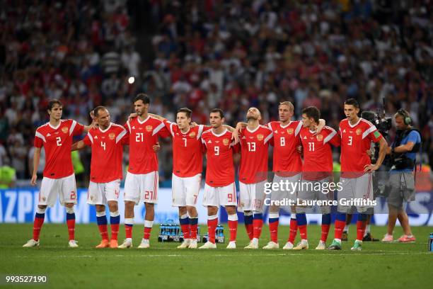 Russia players watch the penalty shoot out during the 2018 FIFA World Cup Russia Quarter Final match between Russia and Croatia at Fisht Stadium on...