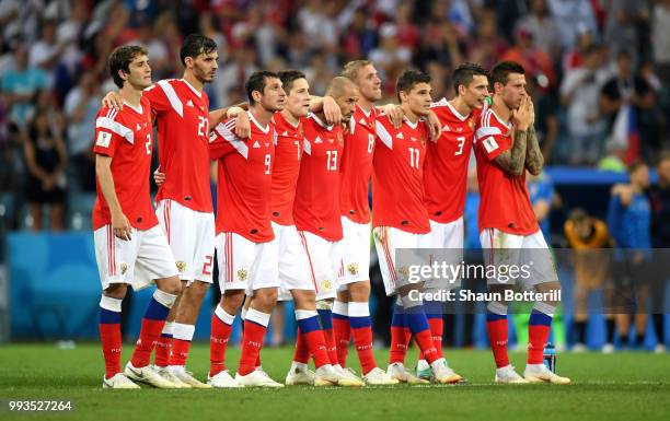 Russia players watch the penalty shoot out during the 2018 FIFA World Cup Russia Quarter Final match between Russia and Croatia at Fisht Stadium on...