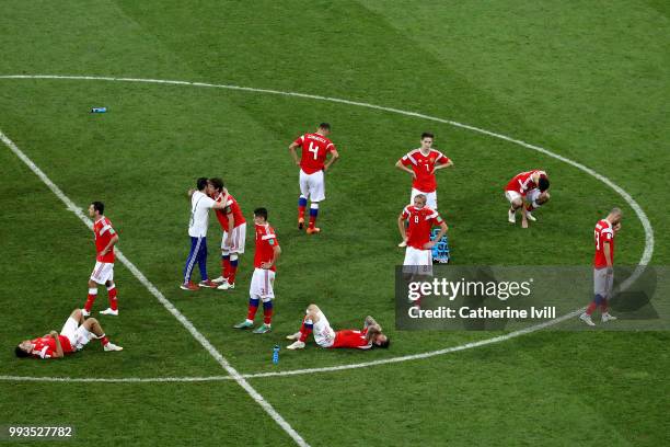 PLayers of Russia show their dejection following the defeat in the 2018 FIFA World Cup Russia Quarter Final match between Russia and Croatia at Fisht...